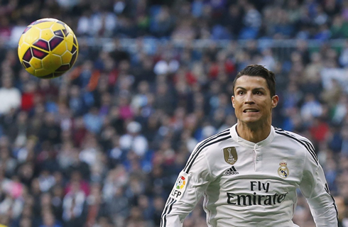Cristiano Ronaldo chasing the ball with his eyes well open