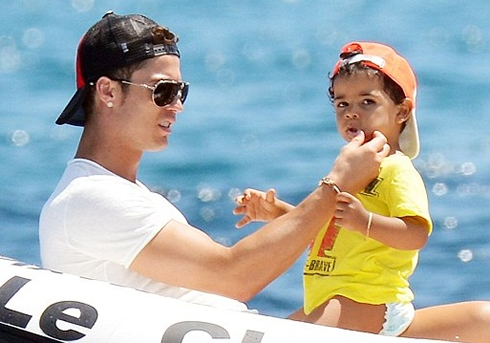 Cristiano Ronaldo with his son, Cristiano Jr, in vacations