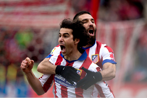 Tiago and Arda Turan celebrating Atletico Madrid goal vs Real Madrid