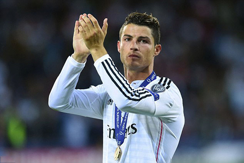 Cristiano Ronaldo with the UEFA Champions League medal around his neck