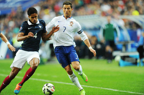 Cristiano Ronaldo running against Varane in Portugal vs France