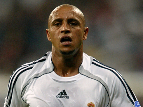 Roberto Carlos wearing a Real Madrid jersey