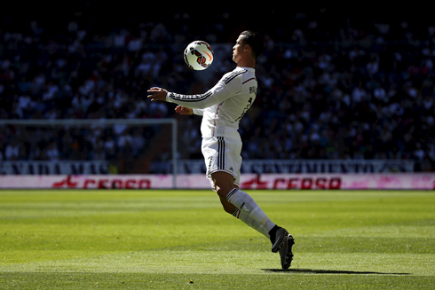 Cristiano Ronaldo chesting down a ball in a Real Madrid game