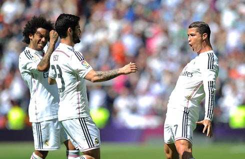 Cristiano Ronaldo celebrates his goal with Marcelo and Isco