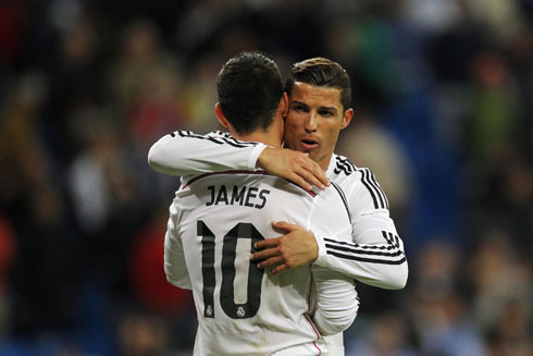 Cristiano Ronaldo and James Rodríguez hug