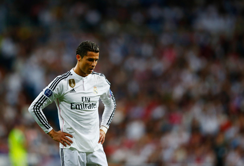Cristiano Ronaldo taking a deep breath in a Champions League game