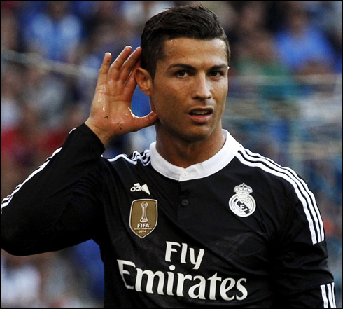 Cristiano Ronaldo reacts to the fans booing him