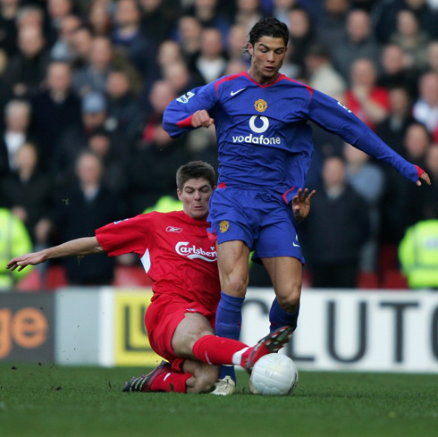 Gerrard tackling Ronaldo in a Premier League game