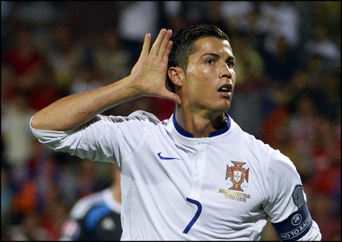 Cristiano Ronaldo pretending he cannot hear the fans