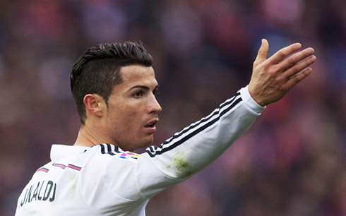 Cristiano Ronaldo raising his hand in protest