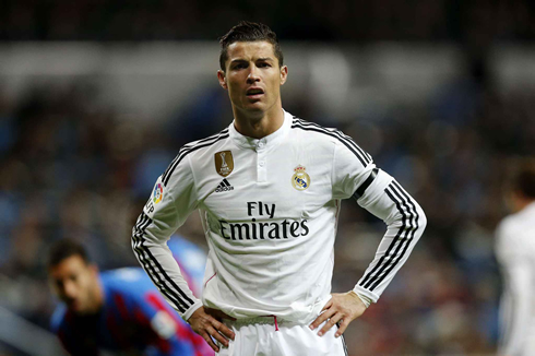 Cristiano Ronaldo standing-still in a football game for Real Madrid