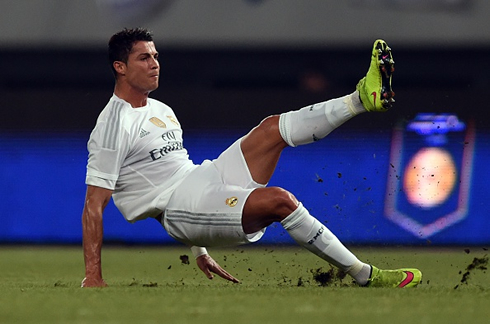 Cristiano Ronaldo attempting a bicycle kick on the ground