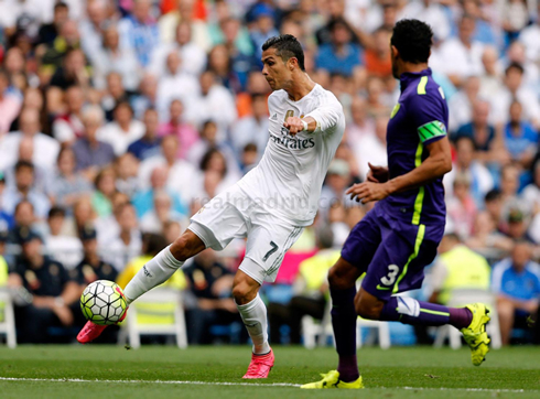 Cristiano Ronaldo going for power in one of his many shots against Malaga