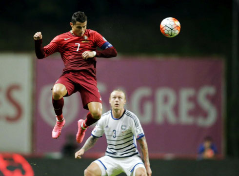 Cristiano Ronaldo flying to head a ball in Portugal vs Denmark
