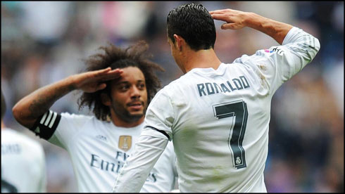 Cristiano Ronaldo and Marcelo army salutation as they celebrate a goal for Real Madrid