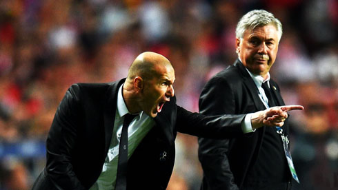 Zinedine Zidane coaching Real Madrid next to Ancelotti