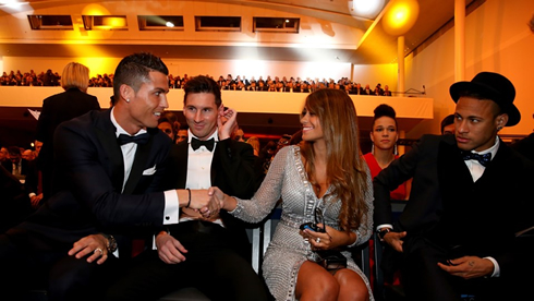 Cristiano Ronaldo next to Messi and his wife, as well as Neymar