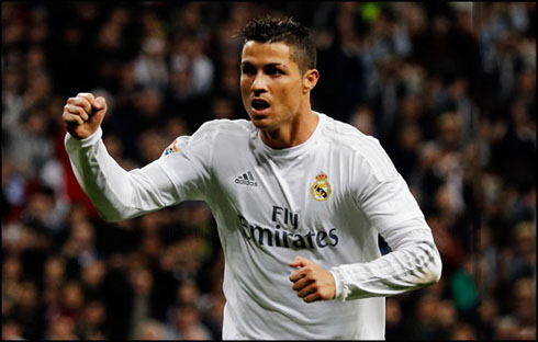 Ronaldo with his fists closed after scoring a goal