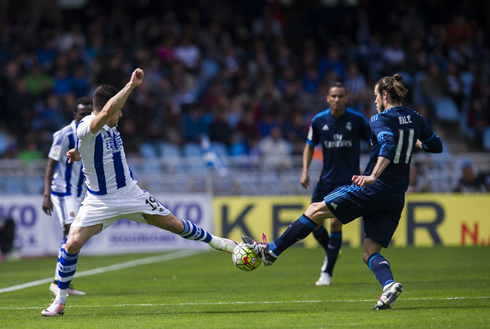 Gareth Bale going on a 50-50 challenge on a loose ball