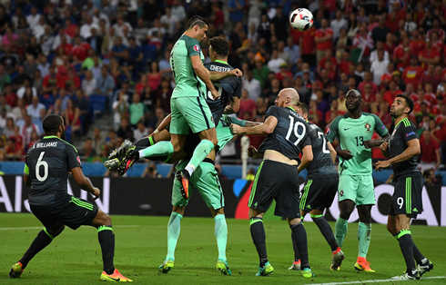 Cristiano Ronaldo jumping high in the air to score a headedr in Portugal 2-0 Wales, in the EURO 2016