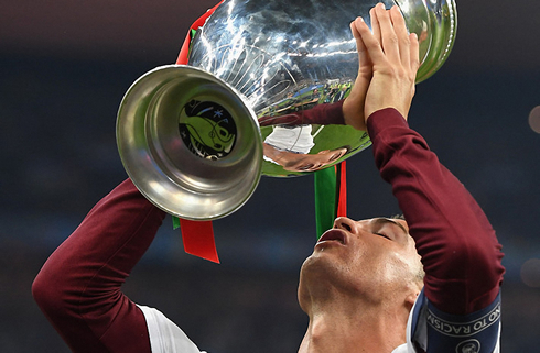 Cristiano Ronaldo lifting the EURO 2016 trophy