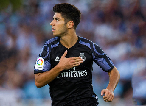 Marco Asensio tapping his chest after scoring for Real Madrid in 2016