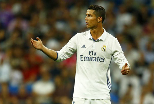 Cristiano Ronaldo disagreeing with the referee decision