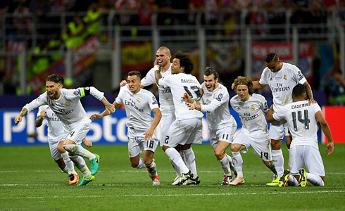 Real Madrid players celebrate victory in penalty shootout in the Champions League final