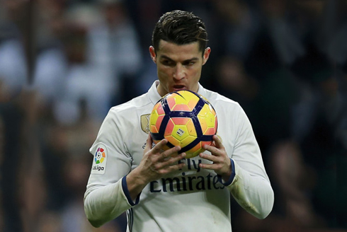 Cristiano Ronaldo kisses the ball before a penalty-kick