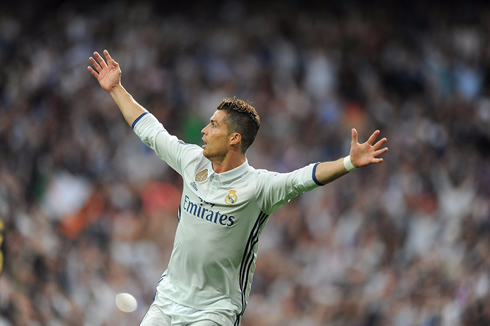 Cristiano Ronaldo scores and puts his arms in the air in Real Madrid 3-0 win over Atletico