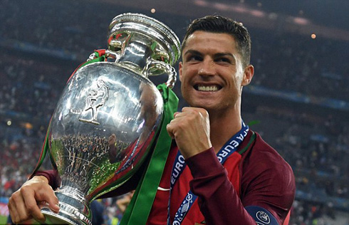 Cristiano Ronaldo holding the EURO 2016 trophy
