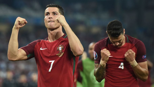 Cristiano Ronaldo turns to the crowd to celebrate EURO 2016 victory