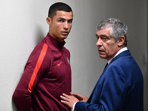 Cristiano Ronaldo caught by the paparazzi talking with Fernando Santos