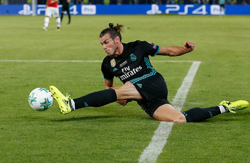 Gareth Bale slips and over stretches to make a cross