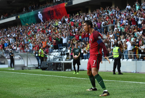 Cristiano Ronaldo jump and landing celebration after scoring for Portugal