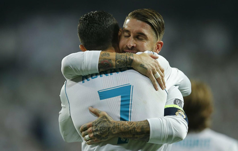 Sergio Ramos hugs Cristiano Ronaldo during a game for Real Madrid