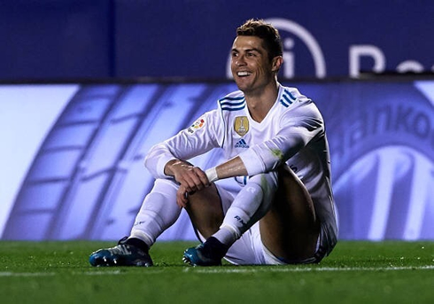 Cristiano Ronaldo sits down to smile ironically