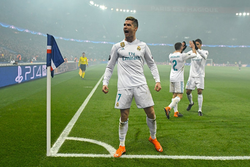 Cristiano Ronaldo scores and celebrates near the corner flag in Paris, against PSG