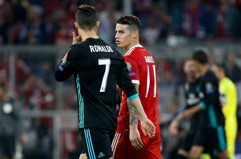 Ronaldo and James Rodriguez exchanging a few words