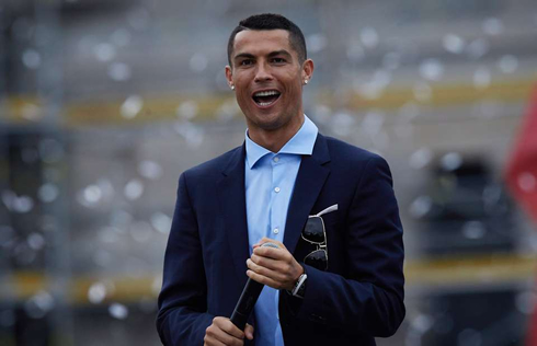Cristiano Ronaldo wearing a suit in Real Madrid celebrations at the Cibeles in 2018