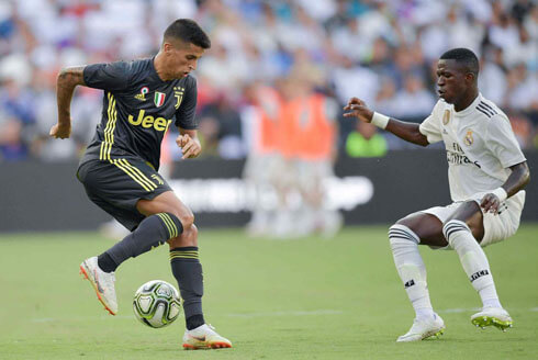 Cancelo and Vinicius Jr in Juventus vs Real Madrid