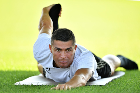 Cristiano Ronaldo stretching in training with Juventus