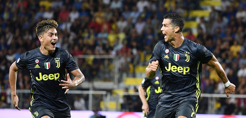 Dybala and Cristiano Ronaldo running around the pitch to celebrate Juventus goal