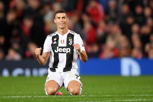 Cristiano Ronaldo on his knees celebrating Juventus win at Old Trafford