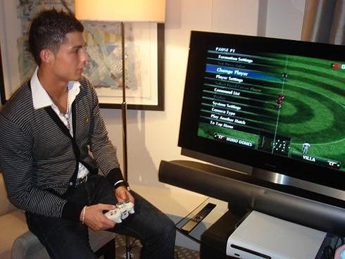 Cristiano Ronaldo playing Pro Evolution Soccer 2011-2012