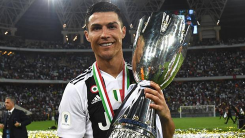 Cristiano Ronaldo with his first trophy for Juventus