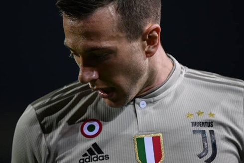 Bernardeschi wearing a Juventus grey shirt