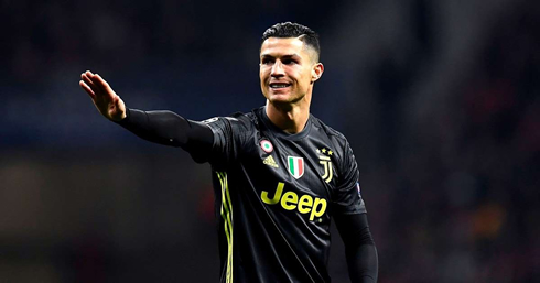 Cristiano Ronaldo in a black Juventus shirt