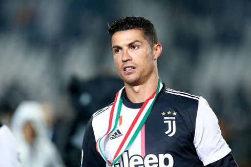 Cristiano Ronaldo wearing a medal around his neck