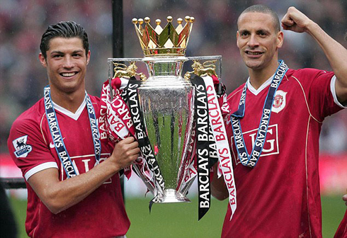 Cristiano Ronaldo and Rio Ferdinand holding the Premier League trophy